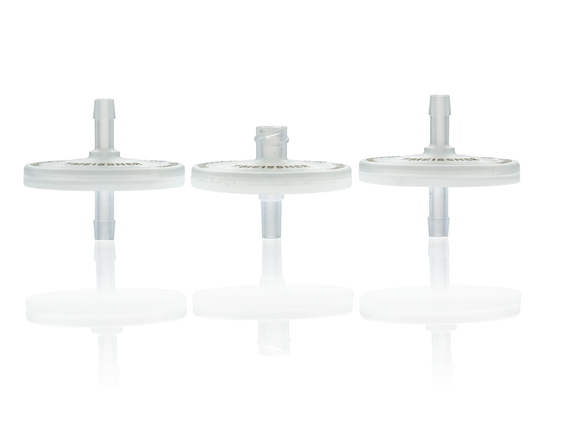 Five clear laboratory filter discs displayed.