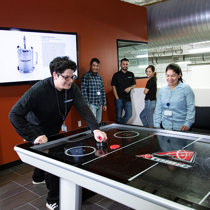 Playing Air Hockey
