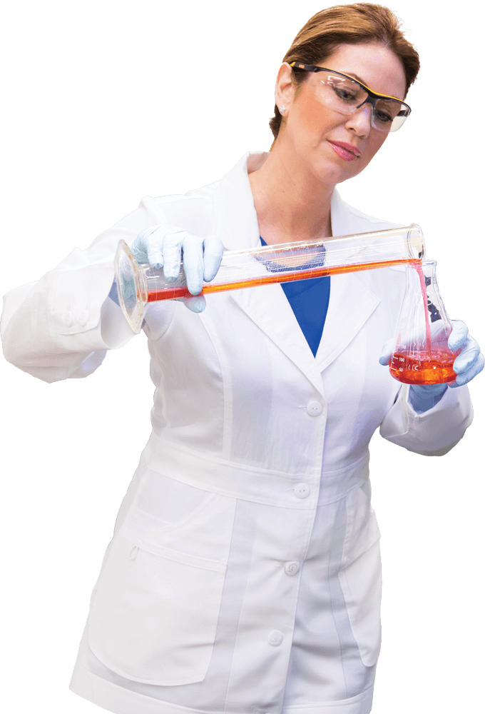Scientist pouring liquid in a laboratory.